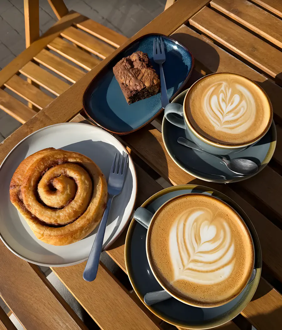 Coffee, a cinnamon swirl and a brownie at Rumi
