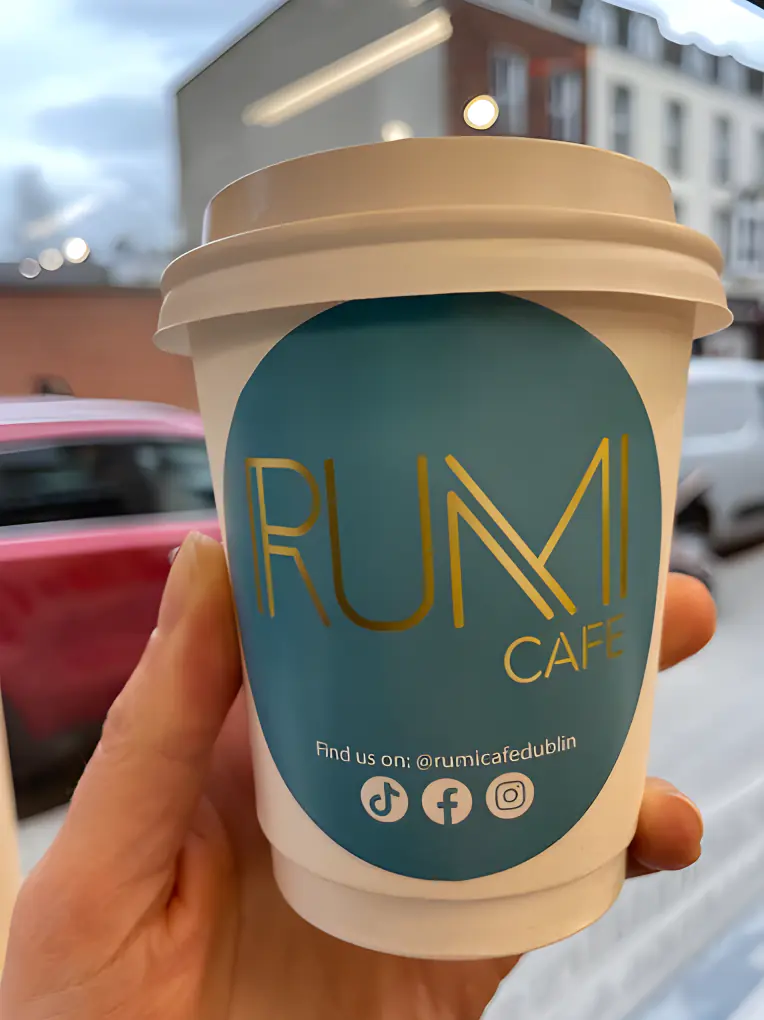 A Rumi takeaway cup